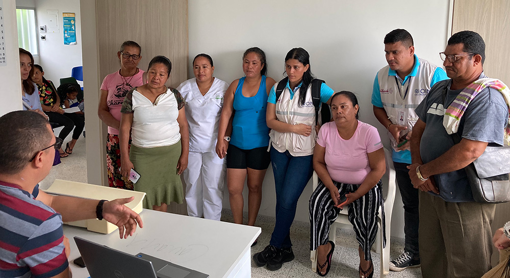 Grupo de Beneficiarios del Bajo Cauca antioqueño recibiendo informacion sobre los nuevos servicios de telemedicina.